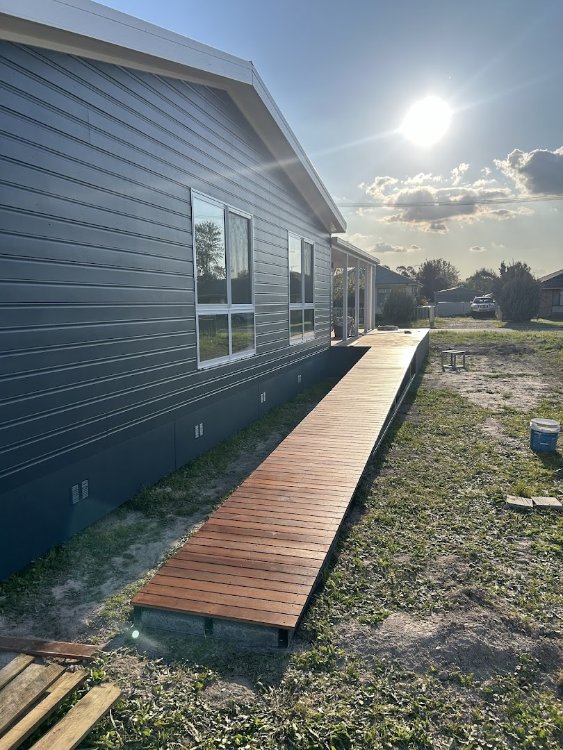 A timber deck built along a home – a real job by Anesbury Fencing & Construction in Wagga Wagga