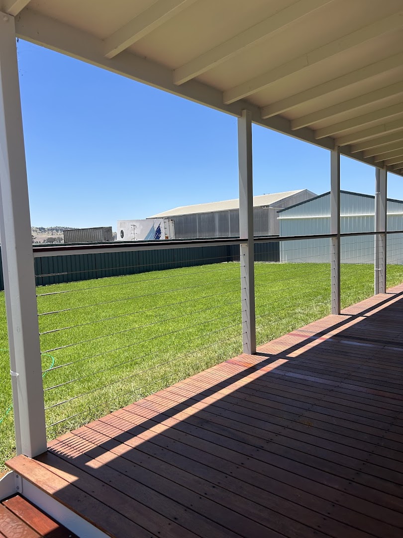 A timber deck under a pergola – a real job by Anesbury Fencing & Construction in Wagga Wagga